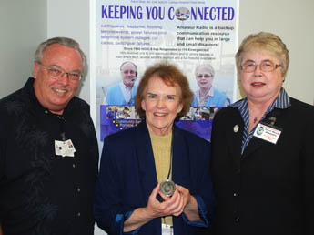 Marianne Goodrich receives coin